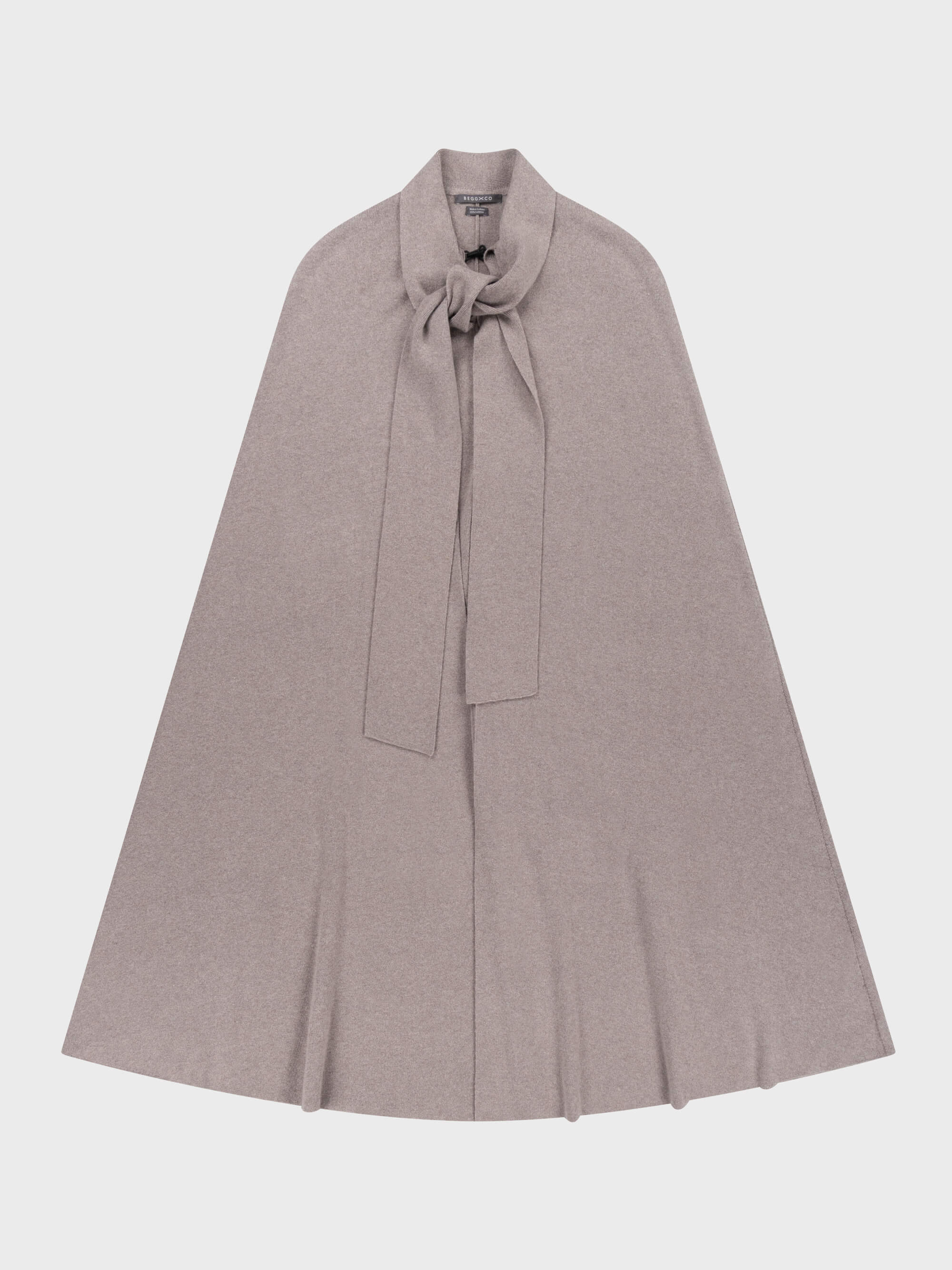 grey cashmere cape with scarf neck on a grey background