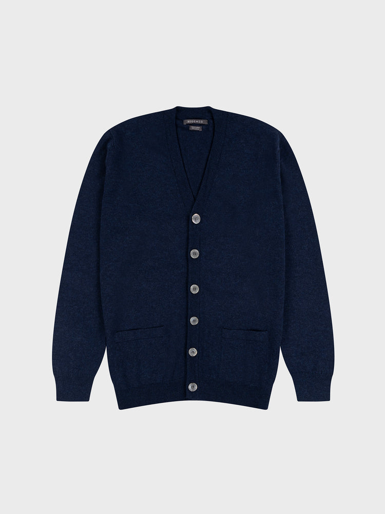 A navy blue, button-up cardigan made of cashmere, displayed against a plain background.