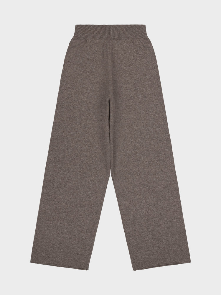 brown cashmere pants on a light gray background