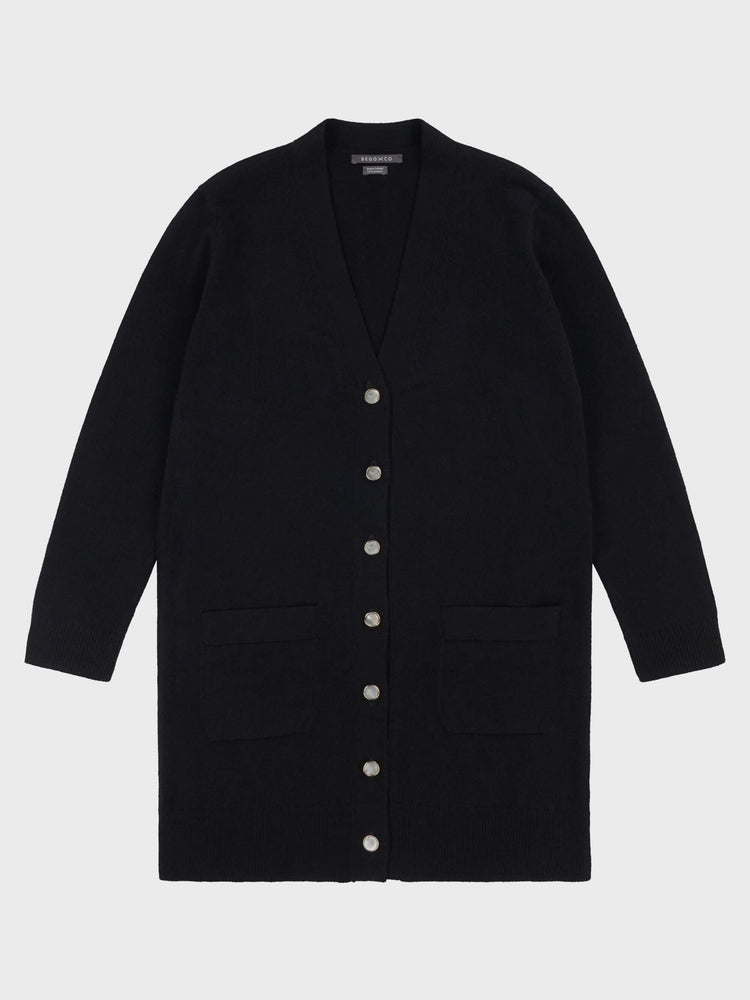 womens long black cashmere cardigan with pearl buttons and pockets on a grey background