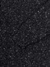 black chunky cashmere roll collar sweater with white speckles ribbed cuff detail