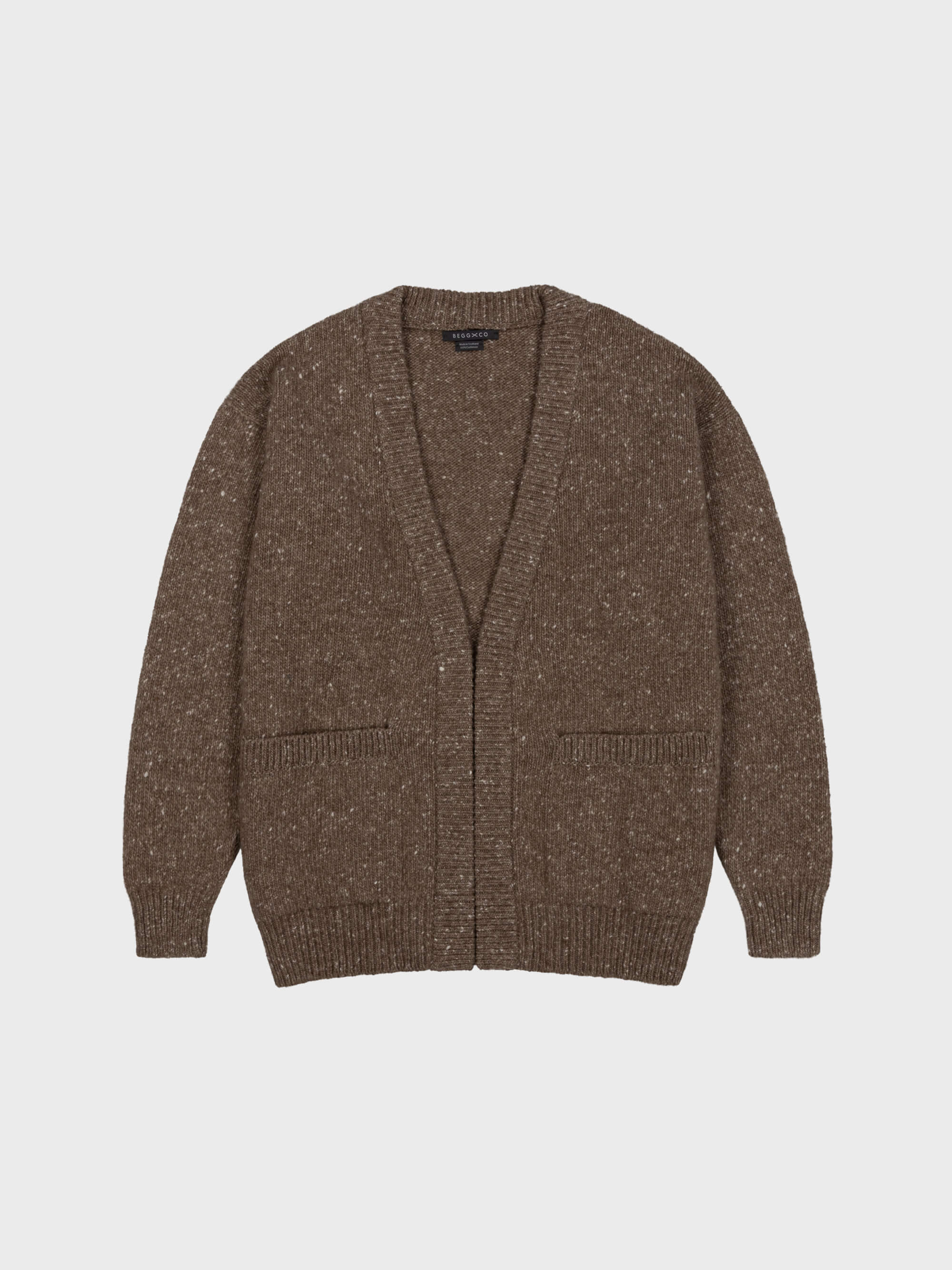 marl brown chunky cashmere cardigan with pockets on a grey background