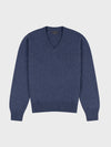 navy v-neck cashmere sweater on a grey background