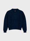 marl navy blue chunky cable knit cashmere sweater on a grey background
