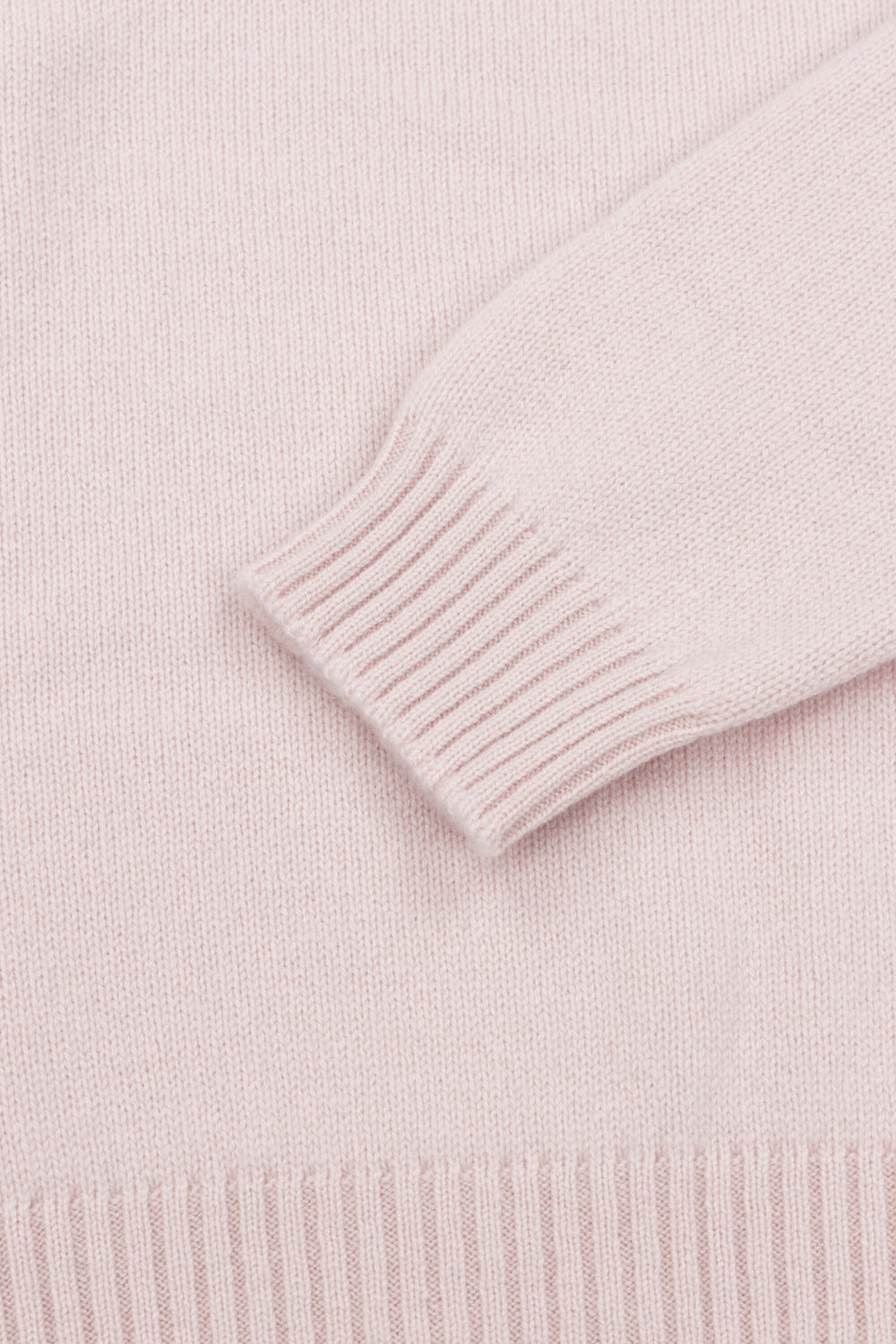 pale pink cashmere crewneck sweater ribbed cuff detail