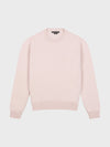 pale pink cashmere crewneck sweater on a grey background
