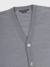 Gray cashmere cardigan with button details on a light gray background
