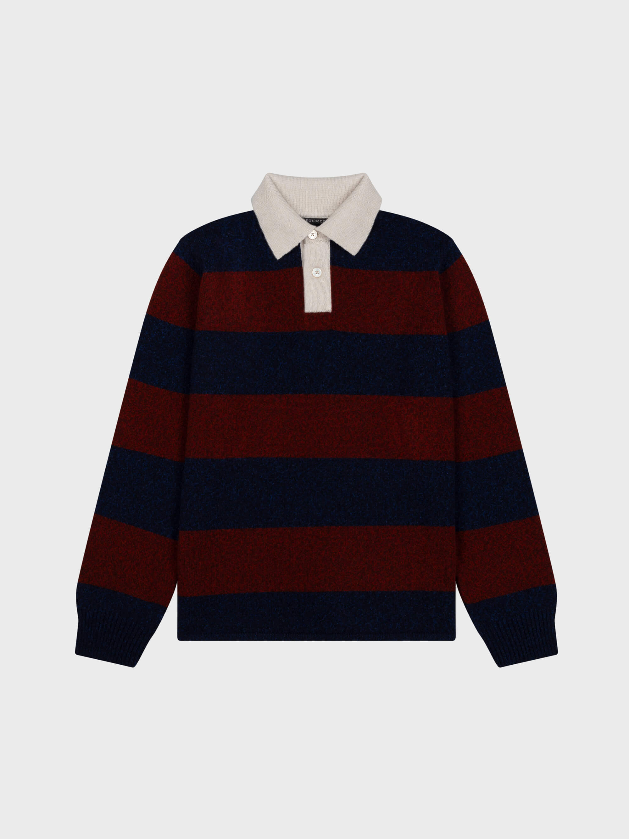 red and navy striped cashmere rugby shirt with contrasting white buttoned collar on a grey background