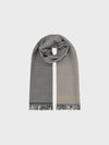 grey and black check cashmere scarf with yellow stripes on a grey background