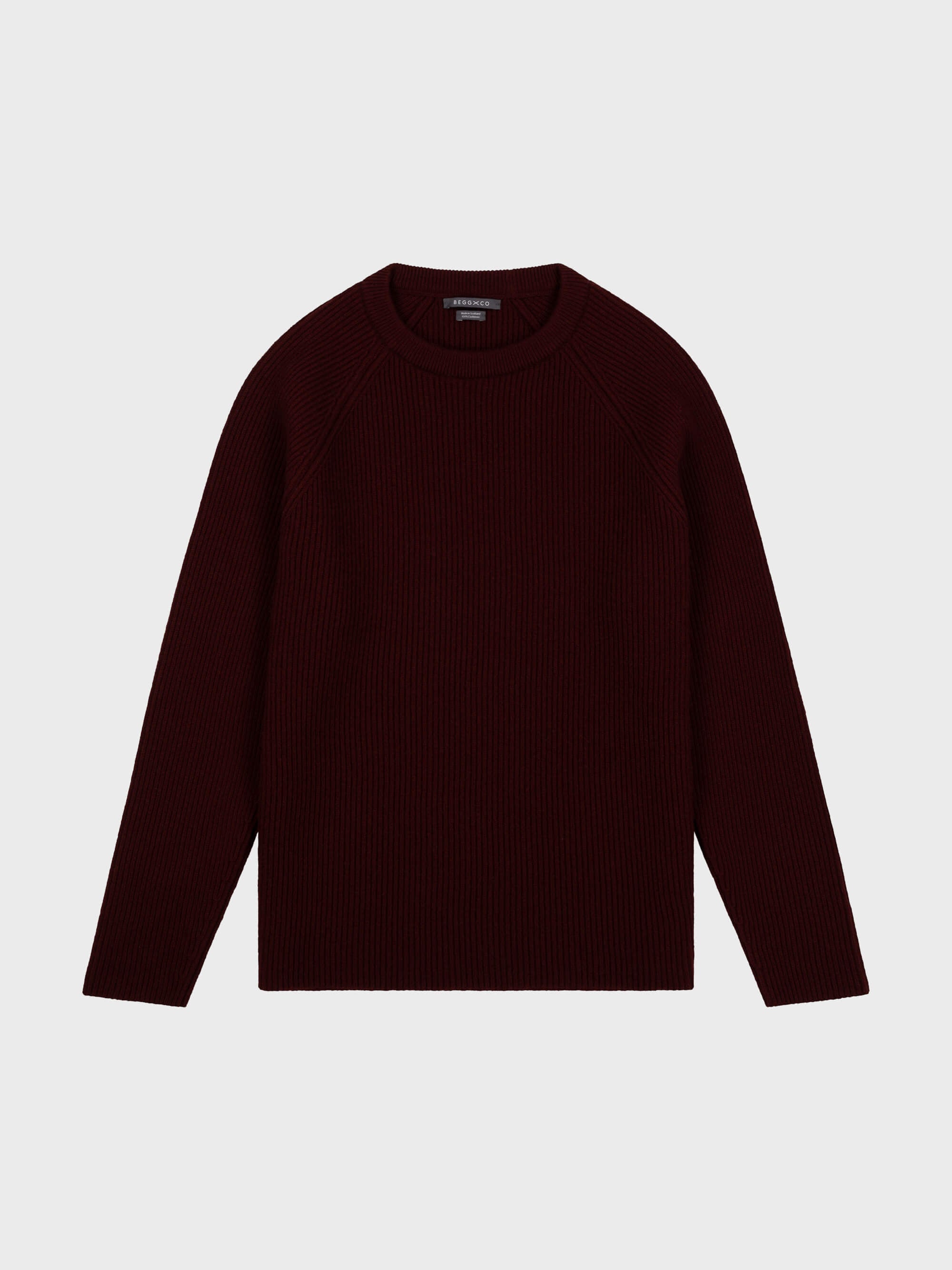 mens wine red cashmere crew neck ribbed sweater on a grey background