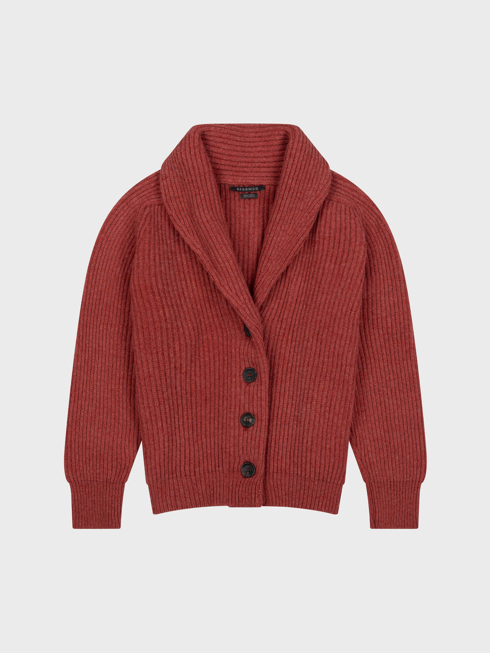 chunky ribbed red cashmere shawl collar cardigan with horn buttons on a grey background