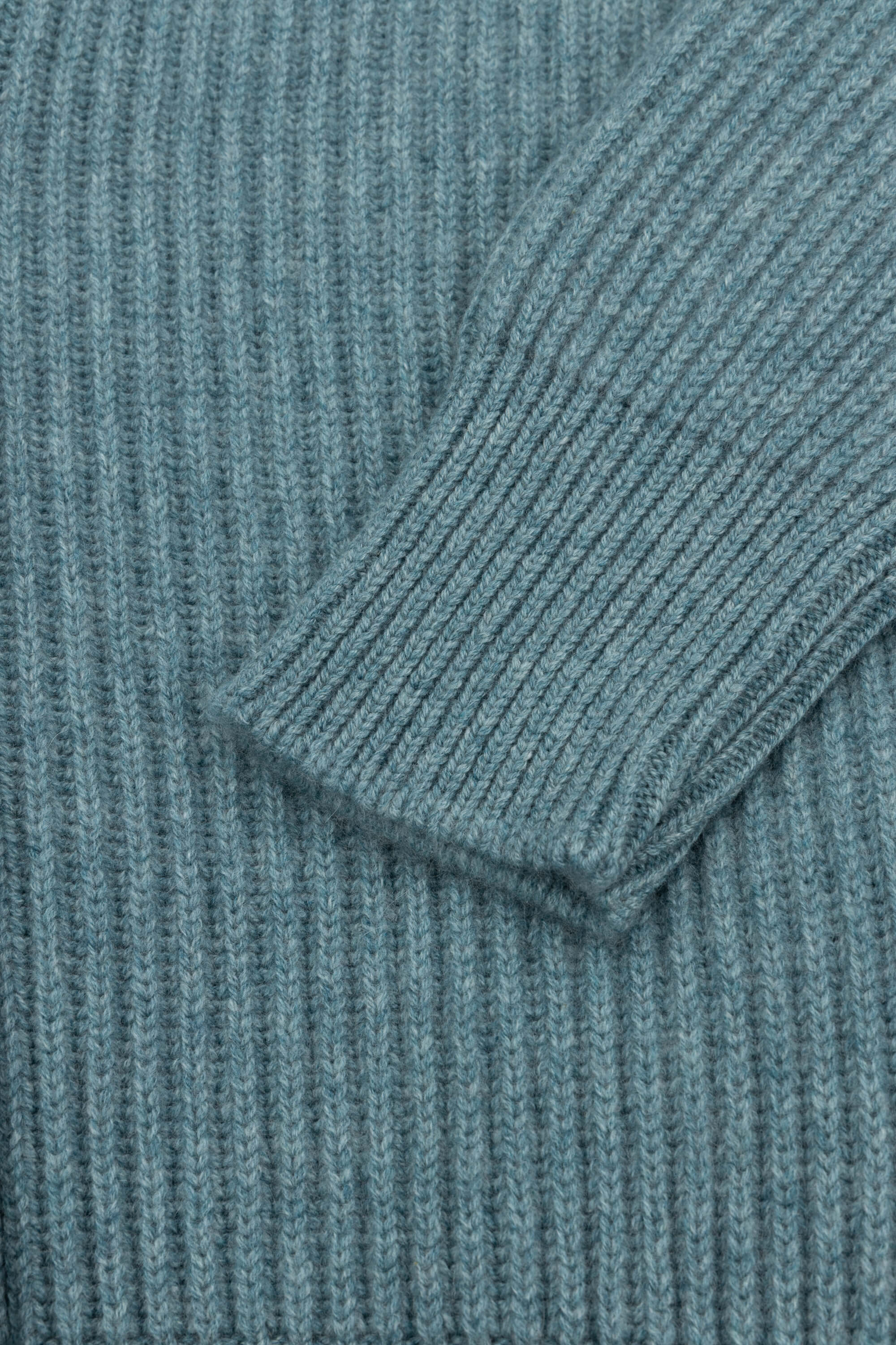 chunky ribbed green cashmere shawl collar cardigan cuff detail