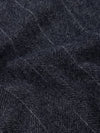 Close-up of dark blue scarf with a herringbone pattern