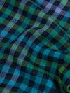 close up of a cashmere scarf with blue, green and purple checks