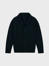 chunky ribbed dark green cashmere shawl collar cardigan on a grey background