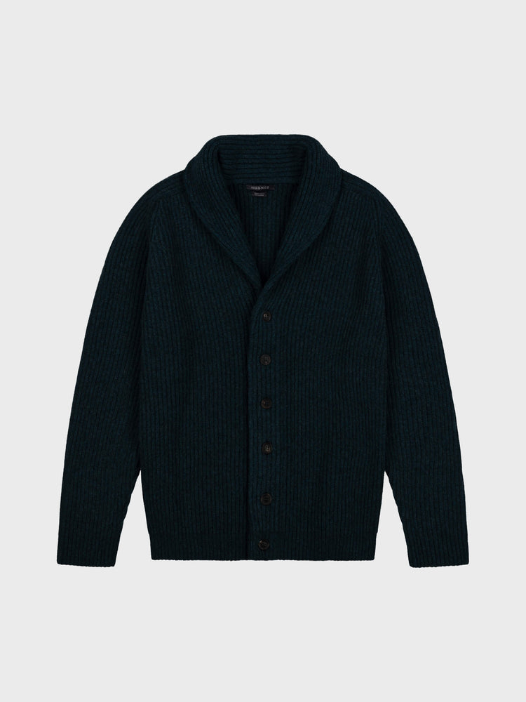 chunky ribbed dark green cashmere shawl collar cardigan on a grey background