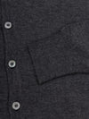 lightweight mens dark grey cashmere cardigan with collar and mother of pearl buttons and ribbed cuff detail on a grey background