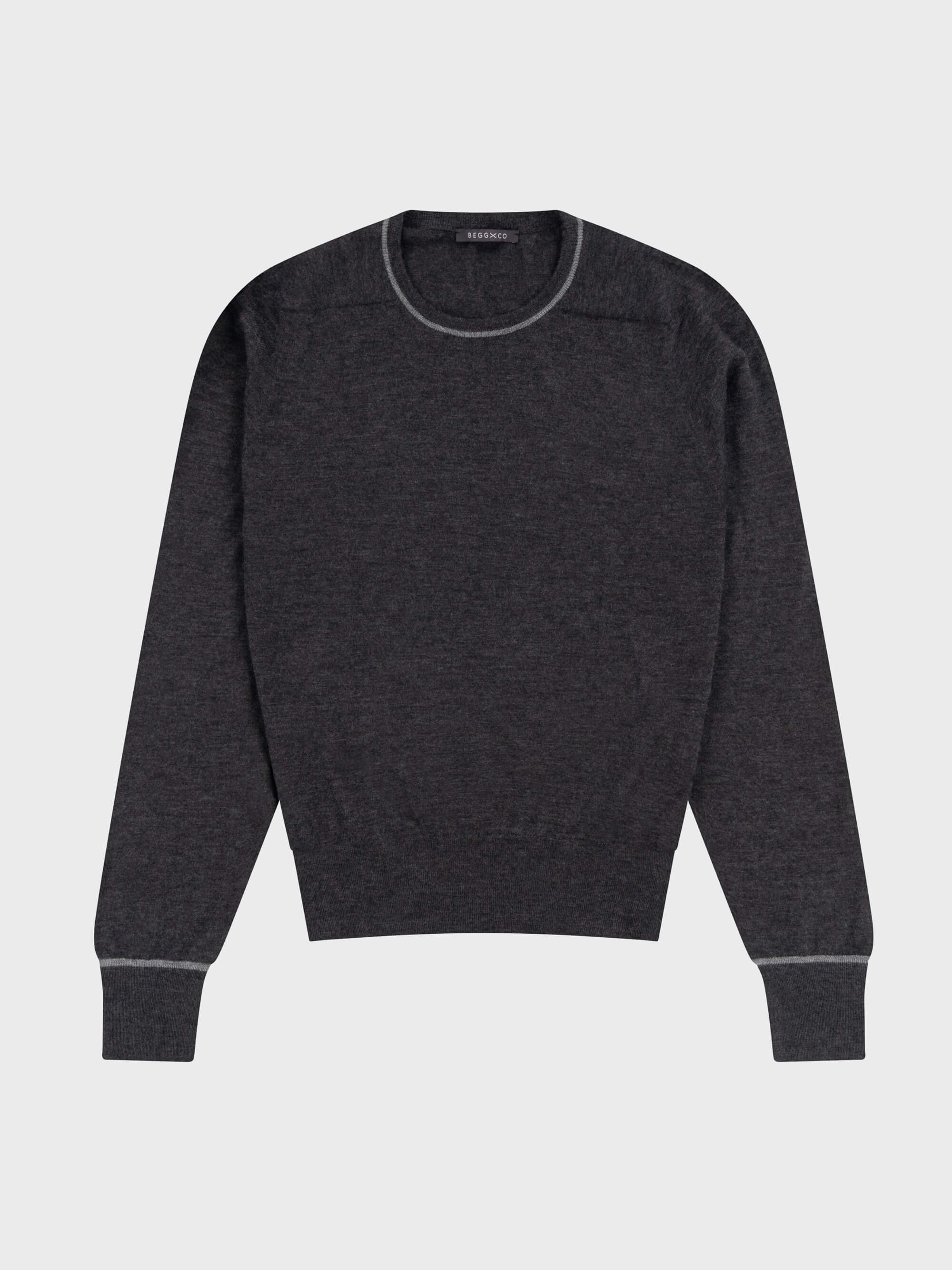 mens dark grey cashmere crewneck sweater with light grey piping details on a grey background