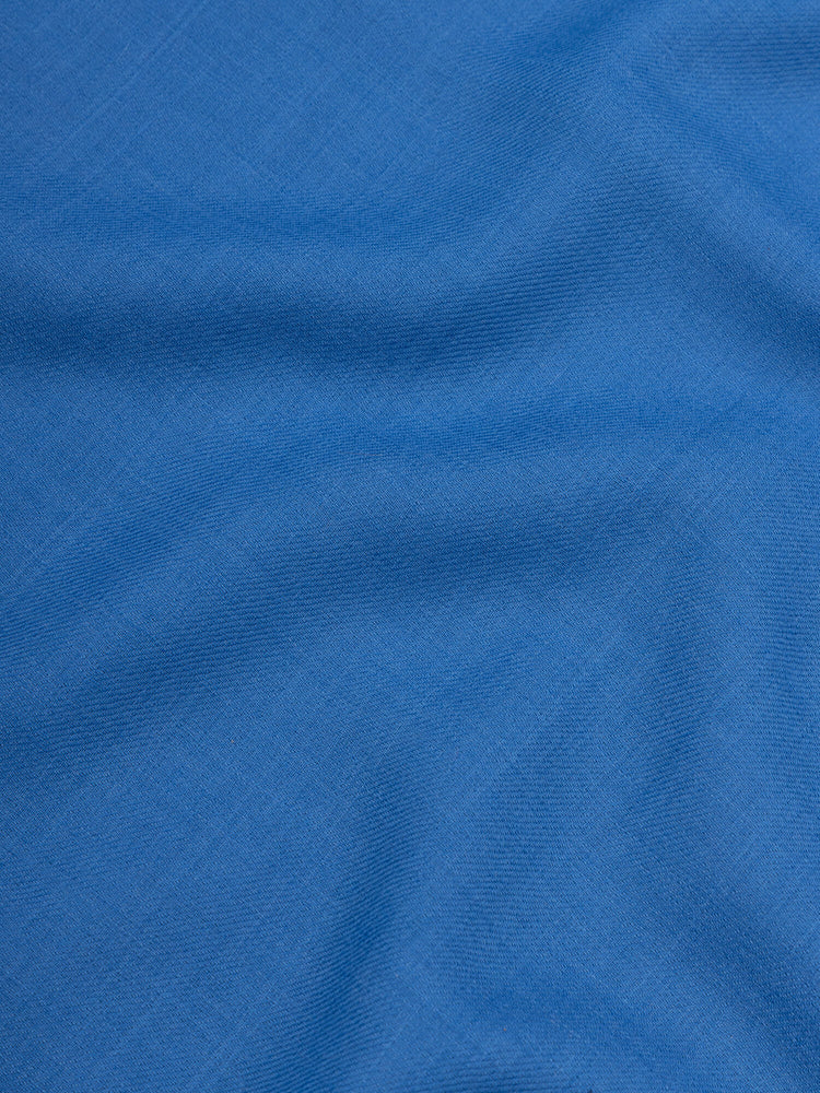 close up of a blue lightweight cashmere scarf 