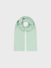lightweight mint green cashmere scarf on a grey background