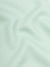 close up of a lightweight mint green cashmere scarf