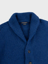chunky ribbed blue cashmere shawl collar cardigan detail on a grey background