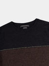 Color-blocked cashmere t-shirt with black, brown, and beige sections on a light gray background