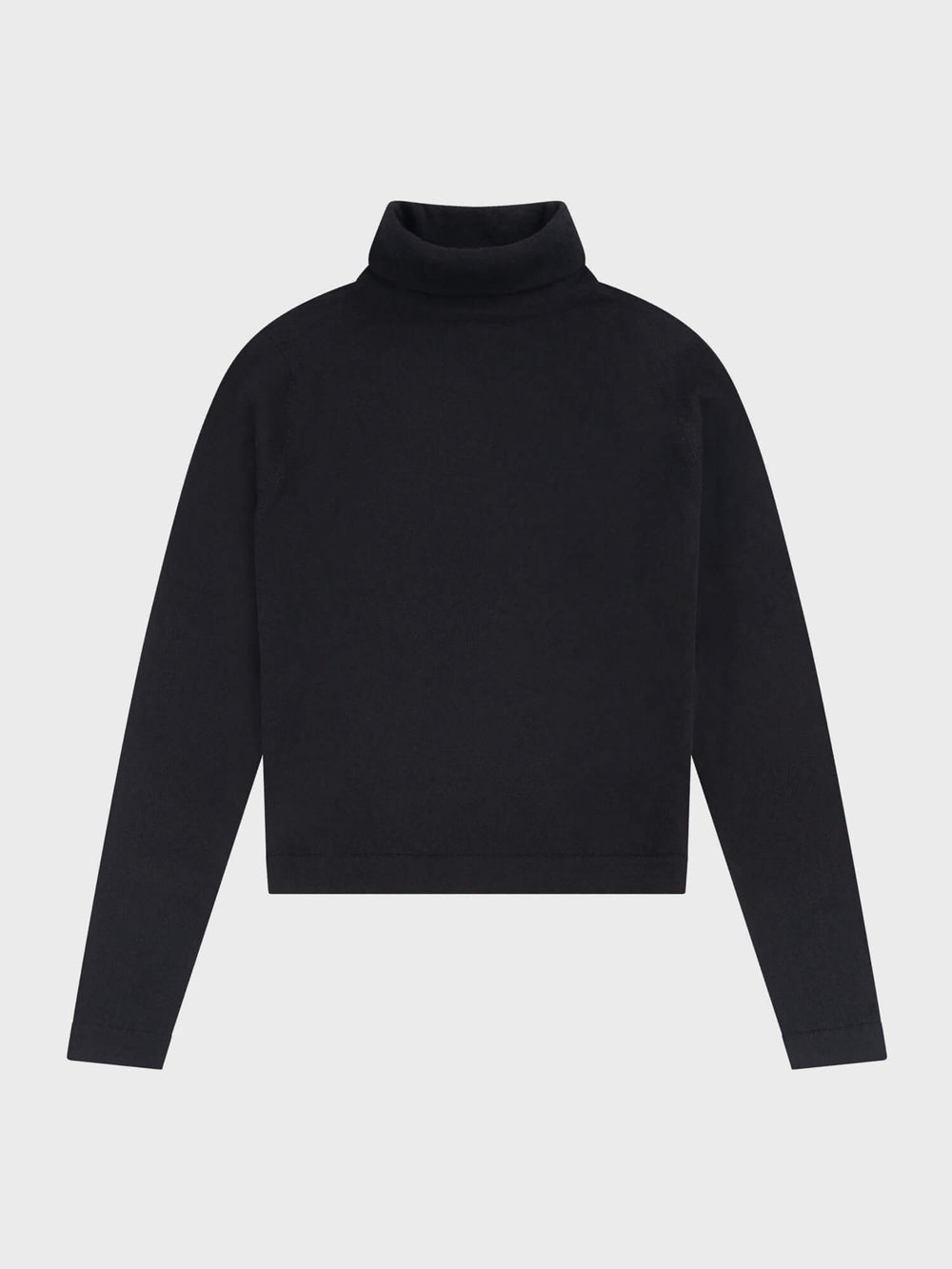 Black turtleneck sweater on a light gray background