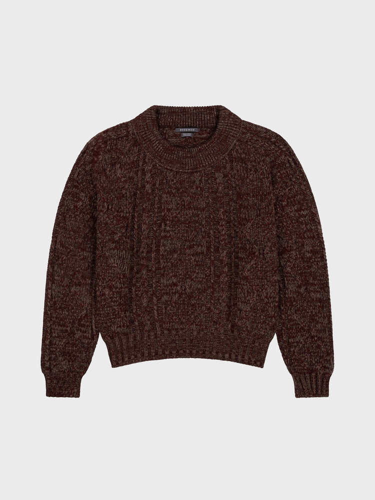 Brown and red knitted sweater on a light gray background