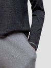 Gray cashmere long-sleeve top and pants on a plain background