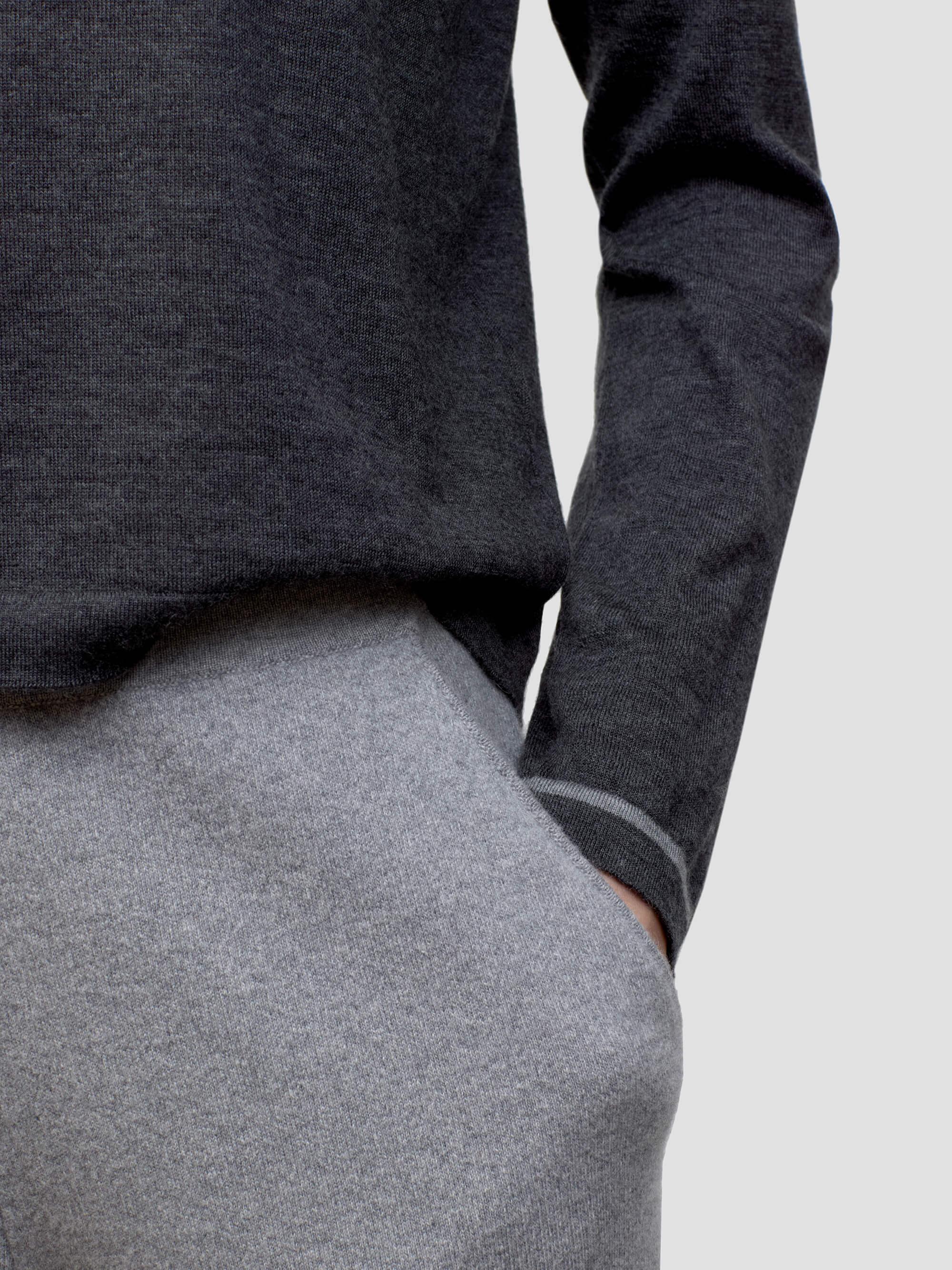 Gray cashmere long-sleeve top and pants on a plain background
