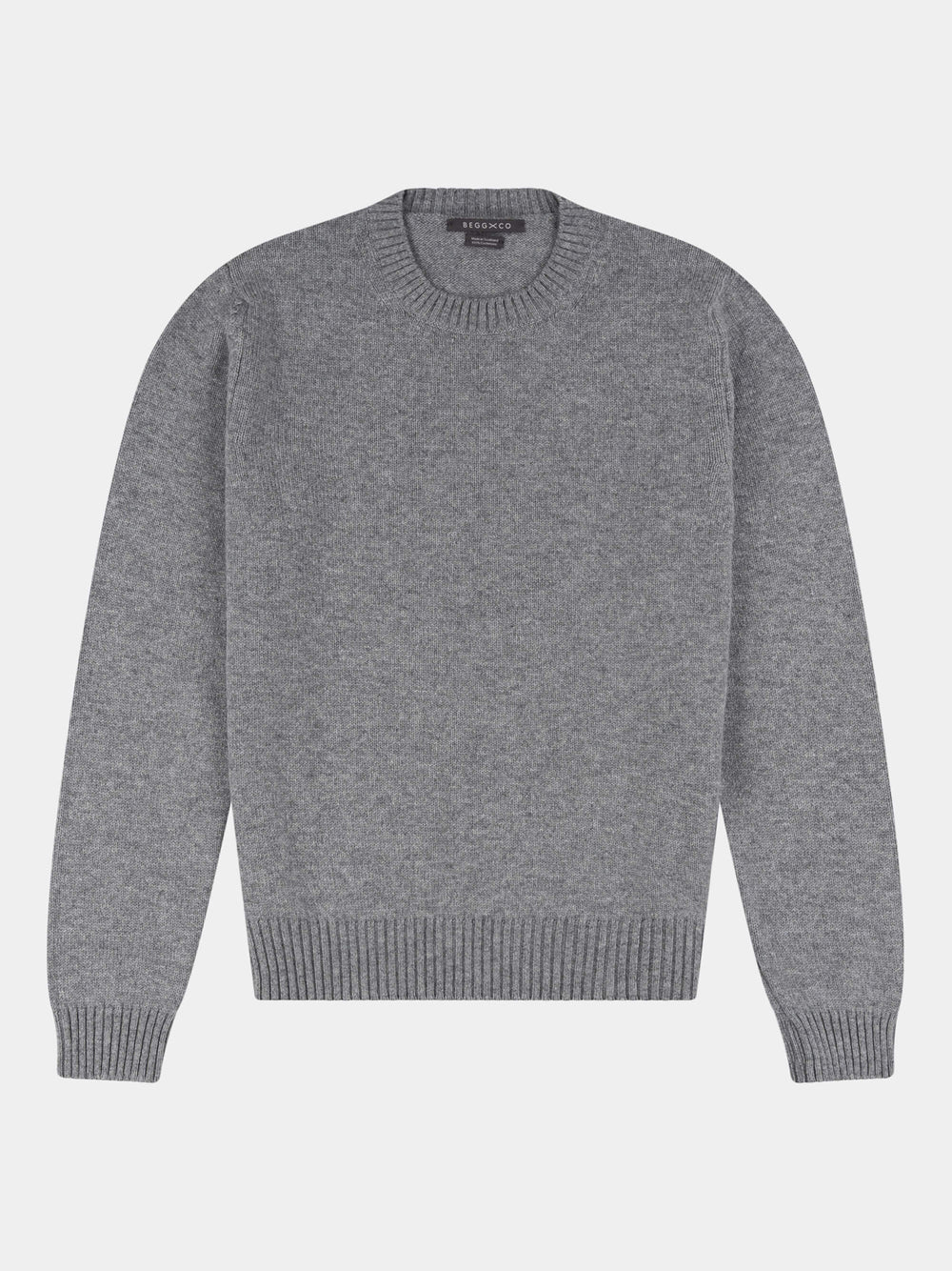Gray cashmere sweater on a light gray background