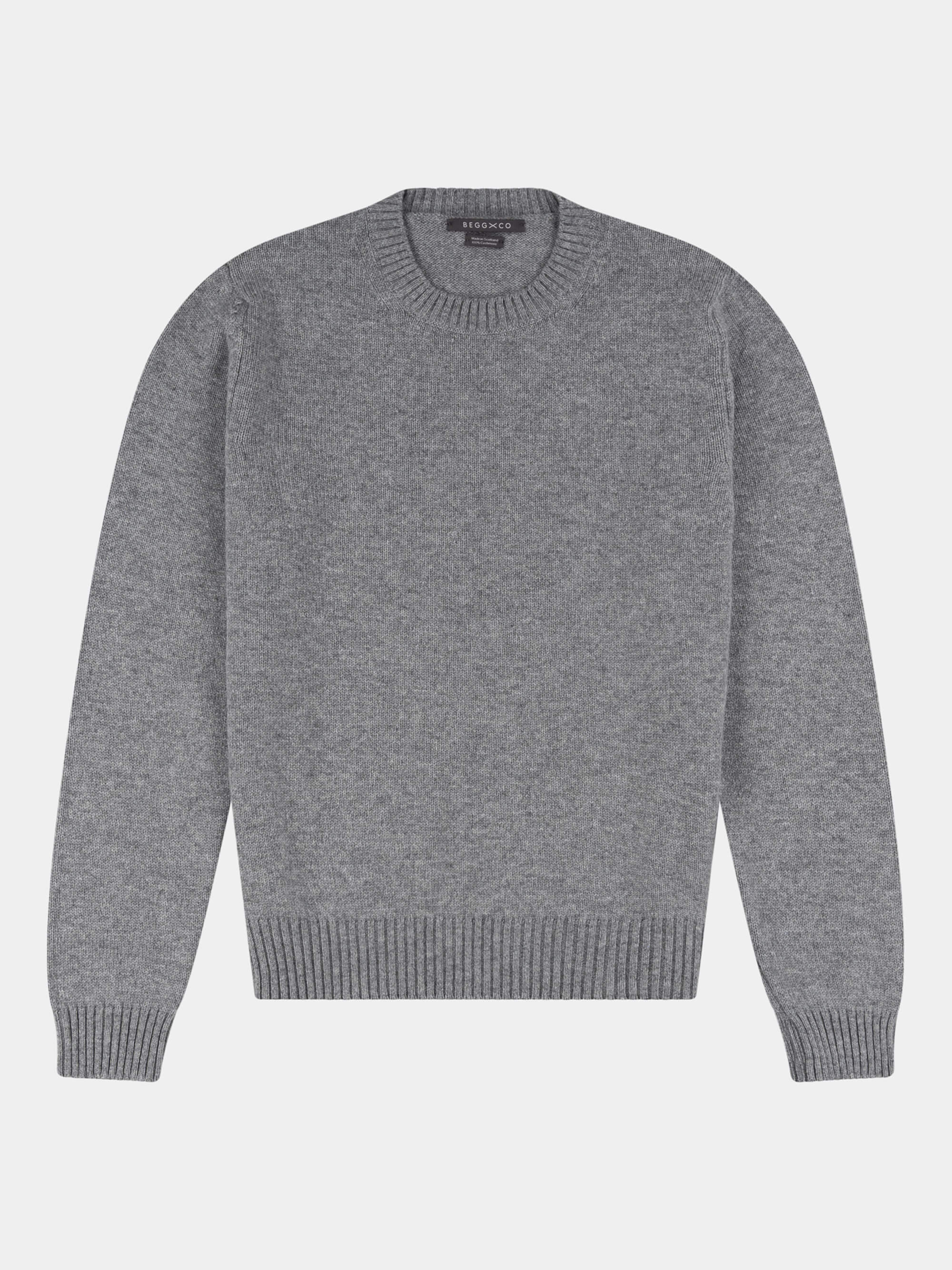 Gray cashmere sweater on a light gray background