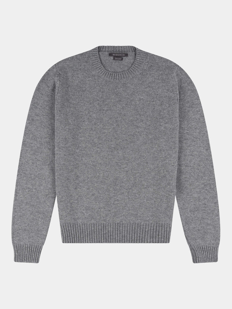 Gray cashmere sweater on a light gray background