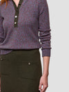 close up of woman wearing green cashmere skirt