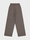 brown cashmere pants on a light gray background