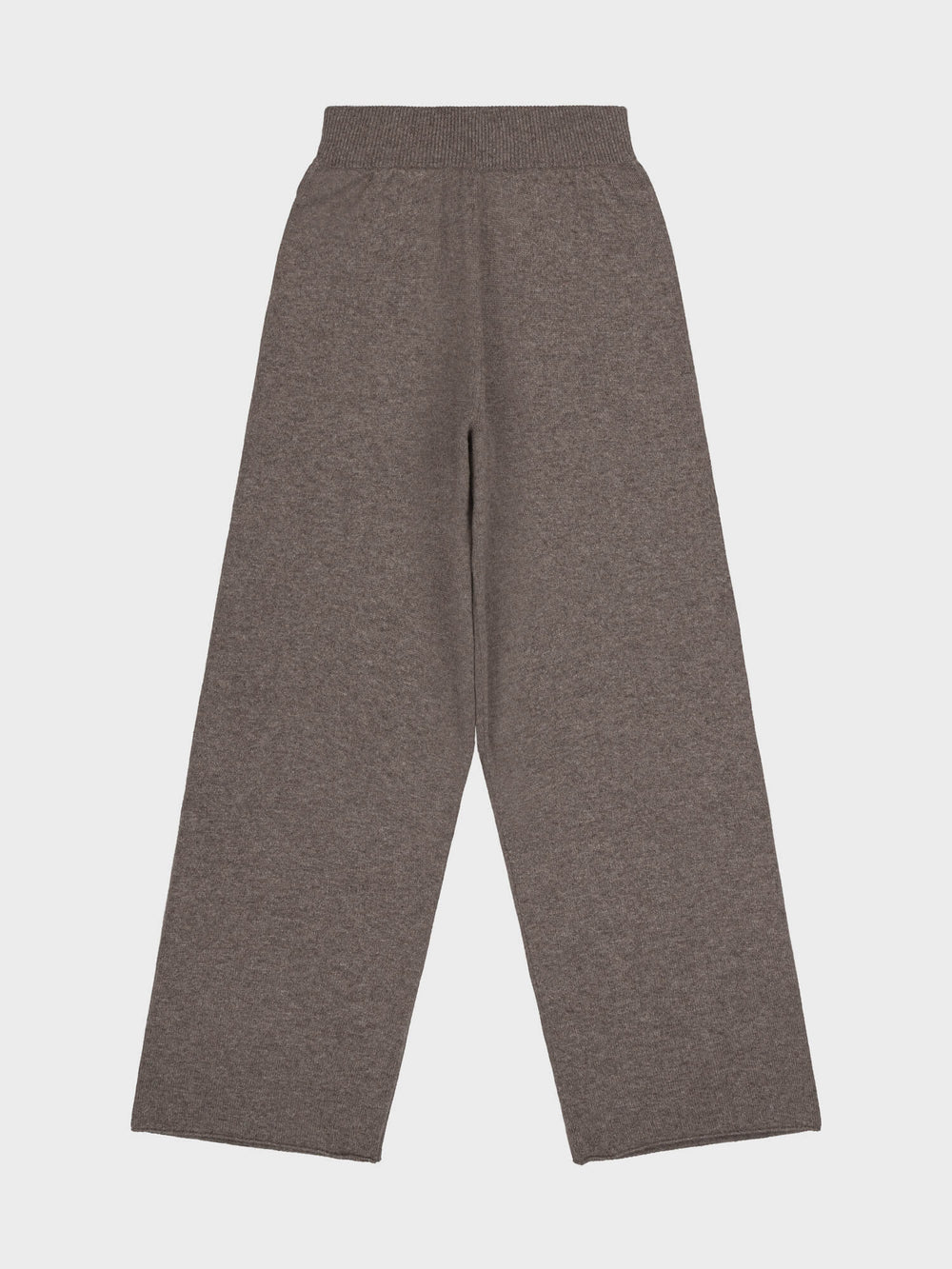 brown cashmere pants on a light gray background