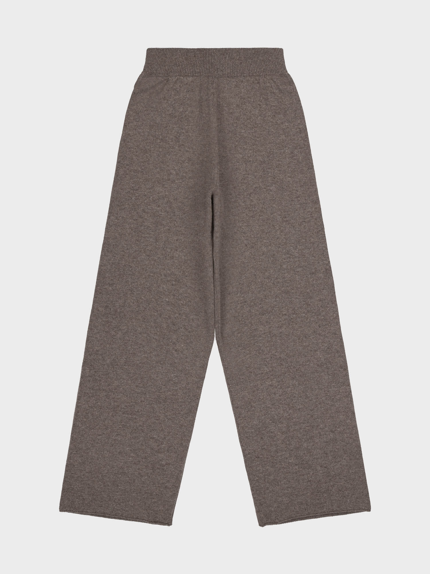 brown cashmere pants on a light gray background