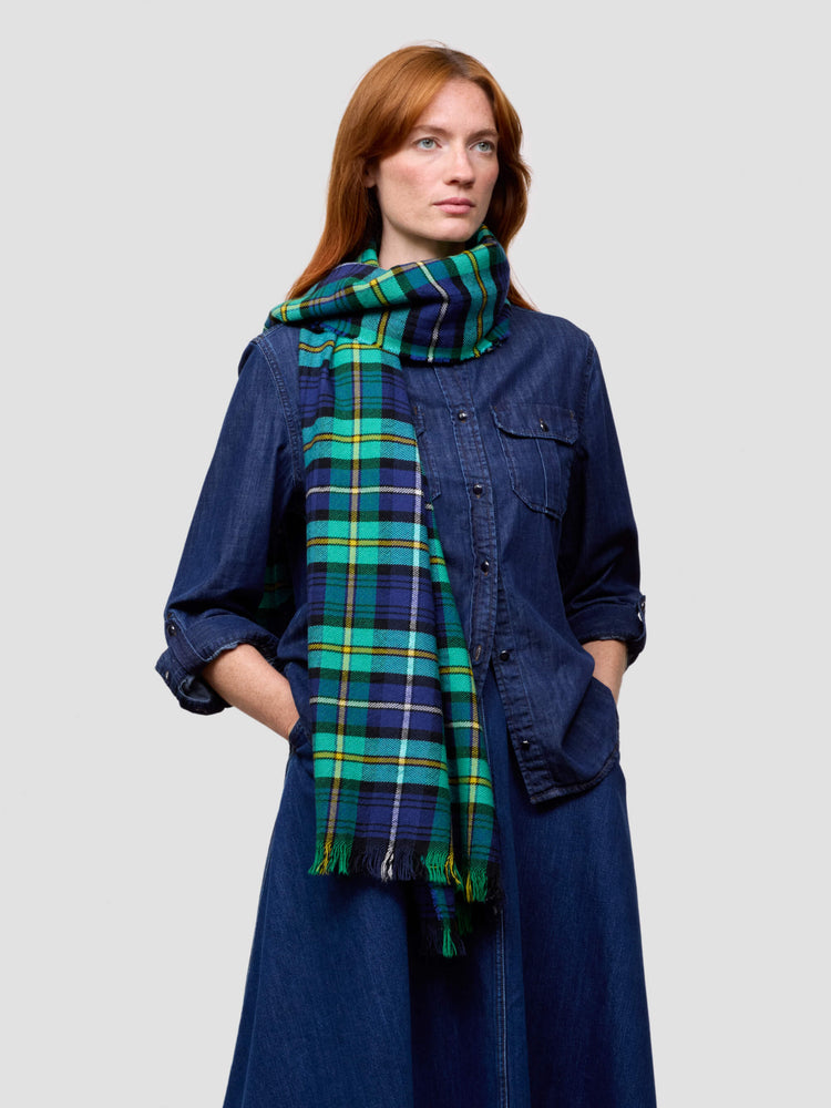 women wearing denim shirt and skirt with green checked scarf